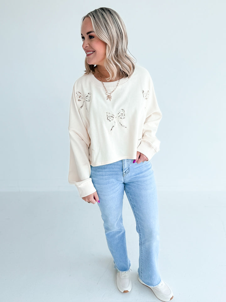 Luck in Lace Bow Crop Sweatshirt