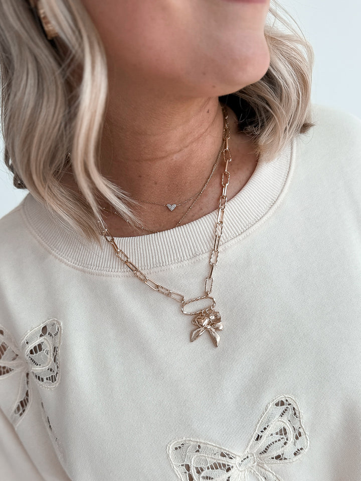 Luck in Lace Bow Crop Sweatshirt