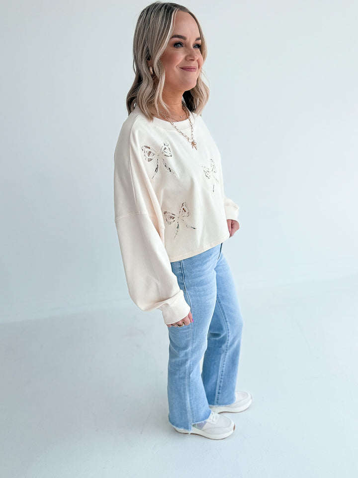 Luck in Lace Bow Crop Sweatshirt