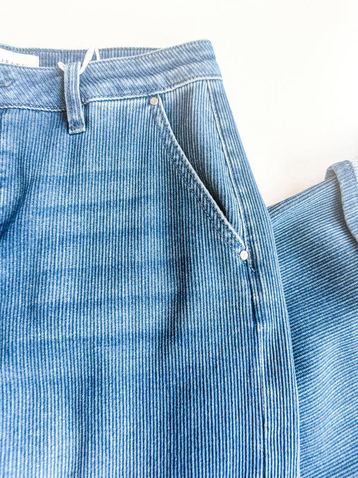 Risen Mid Rise Wide Leg Cuffed Jeans