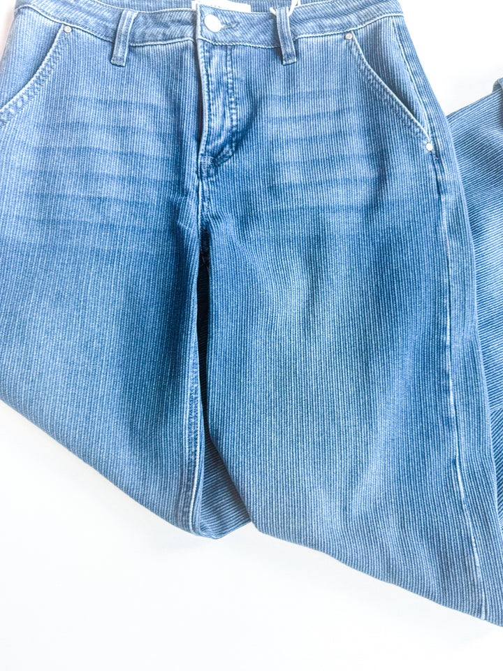 Risen Mid Rise Wide Leg Cuffed Jeans