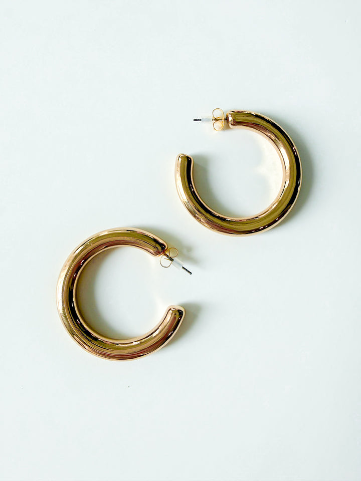 Radiance Statement Tube Hoop Earring