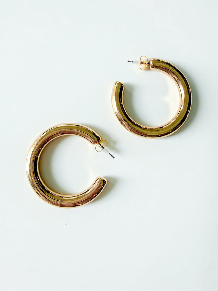 Radiance Statement Tube Hoop Earring