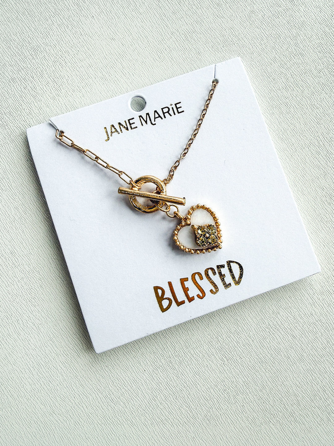 Gold Paperclip Chain with Shell Heart