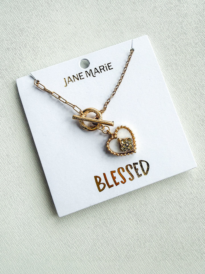 Gold Paperclip Chain with Shell Heart