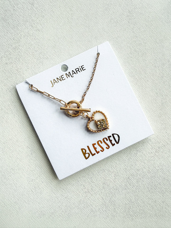 Gold Paperclip Chain with Shell Heart